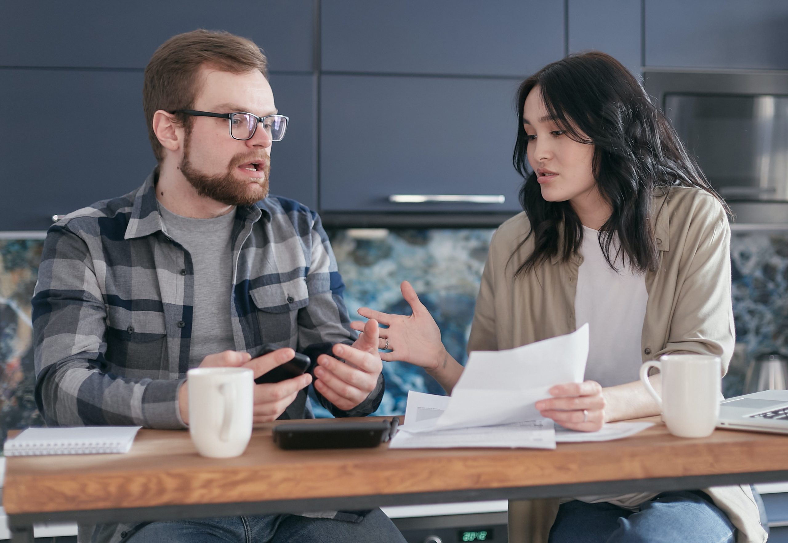 A woman and a man have a business discussion